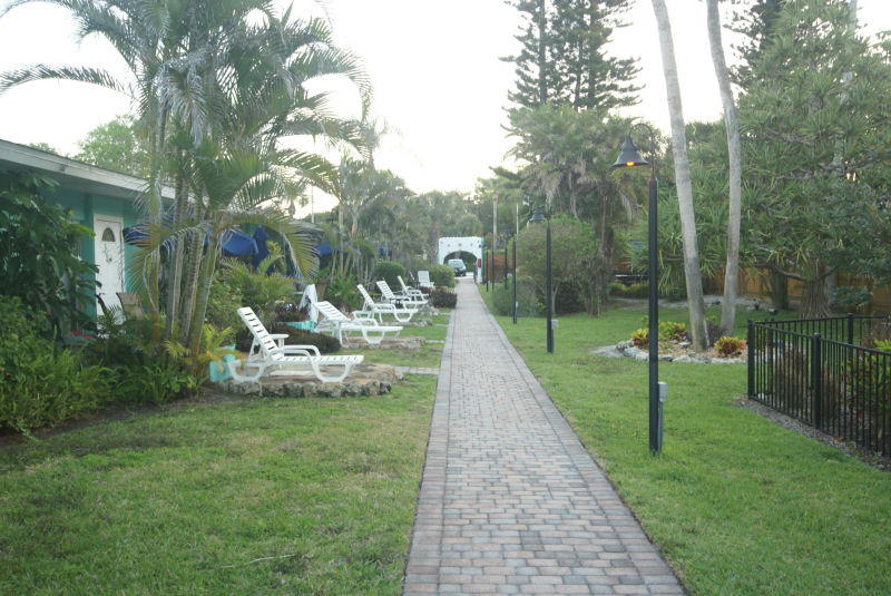 Garden area, walkway looking to front of property
